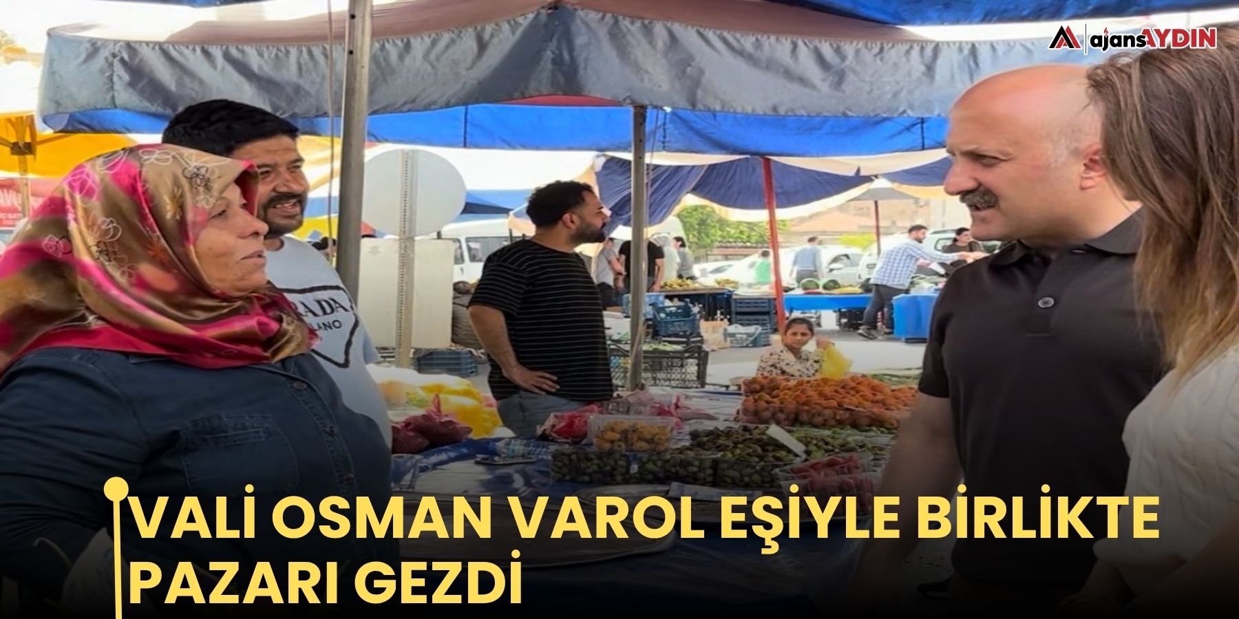 Vali Osman Varol  eşiyle birlikte  pazarı gezdi